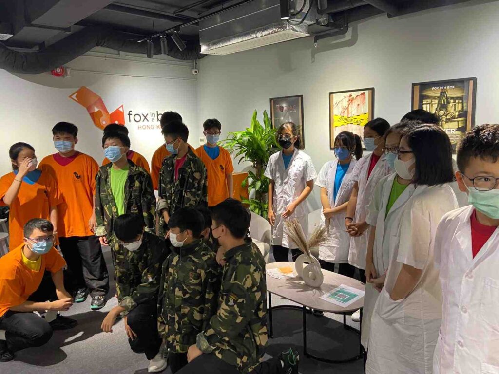 School team smiling after escaping just before the time ran out