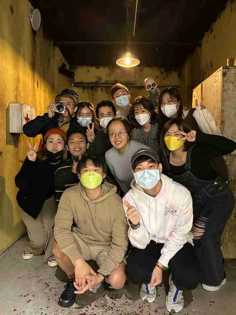 Team of students brainstorming clues in an escape room
