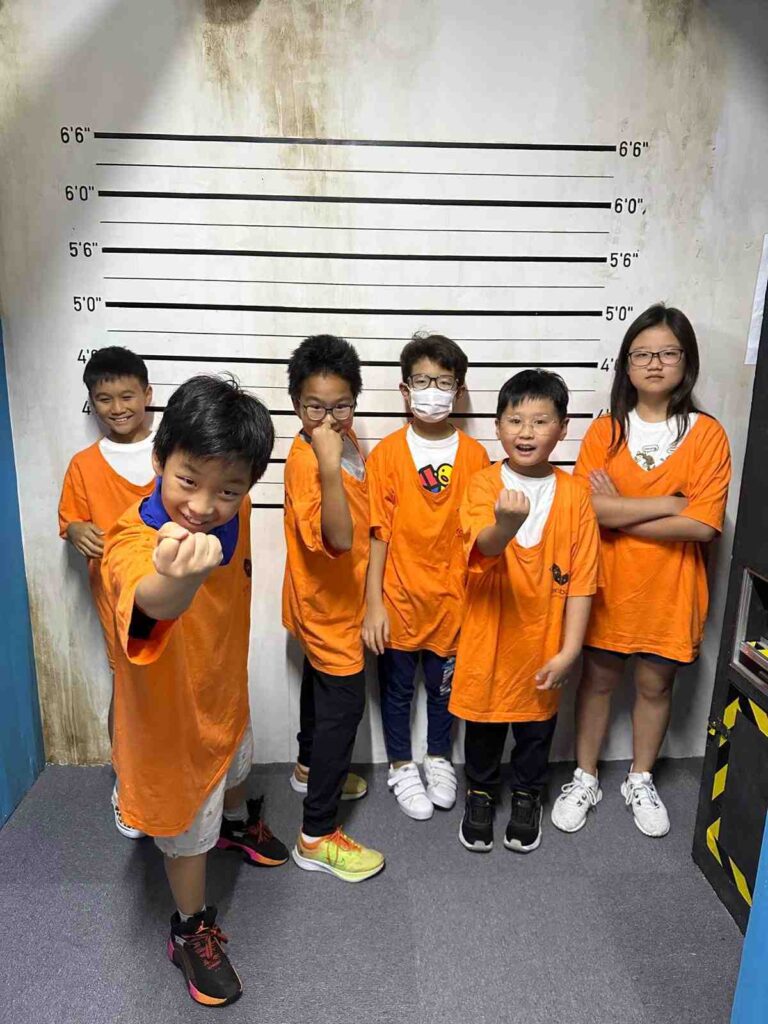 Teachers and students working together in an escape room activity