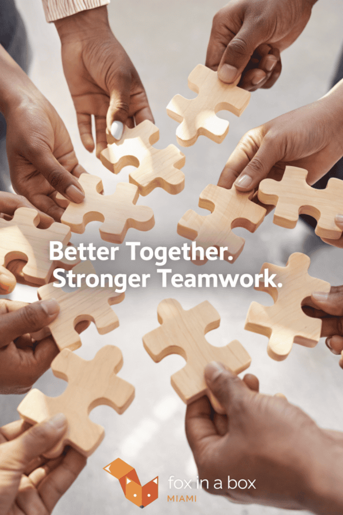 Better together teamwork with hands holding wooden puzzle pieces in team-building activity.