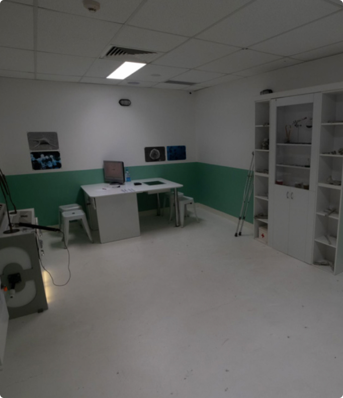 Research laboratory room with scientific equipment and computer setup, inside escape room in Stockholm.