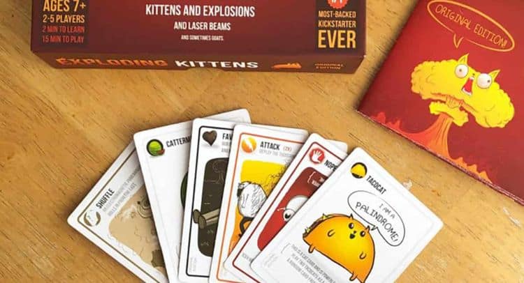 Exploring the escape room game with colorful cards at Fox in a Box Stockholm.